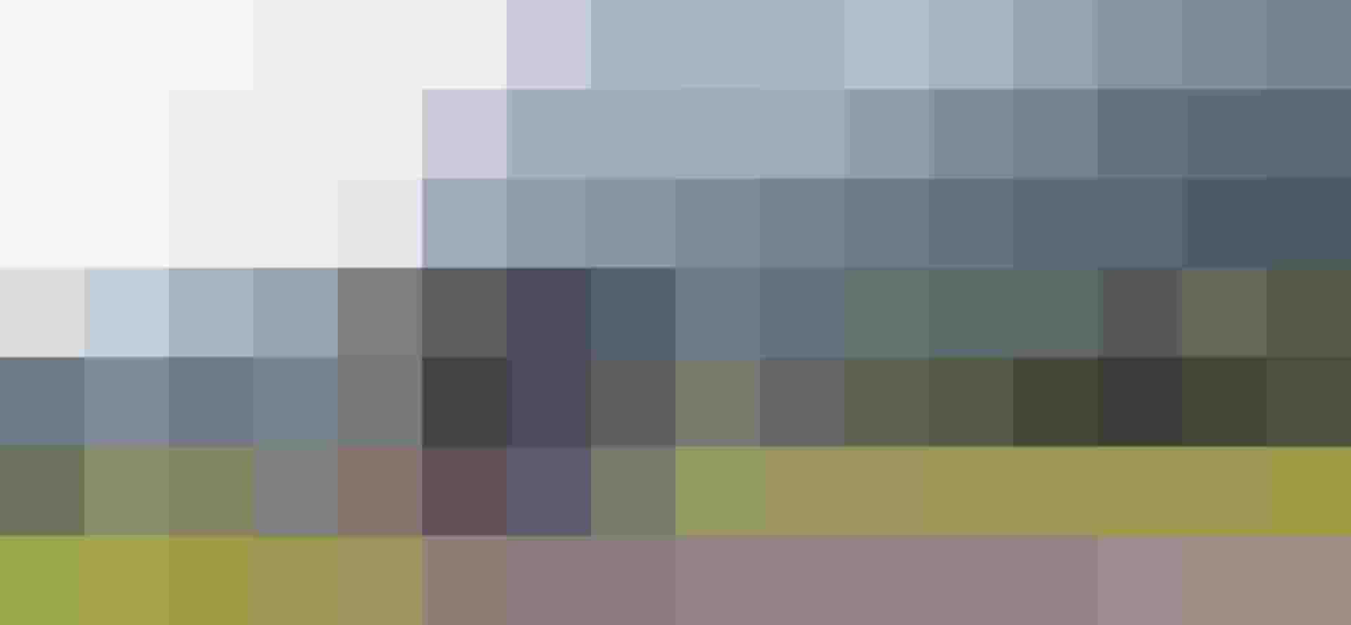 Public Bus Driving through Green Alpine Landscape with Mountains in the Salzburg Region