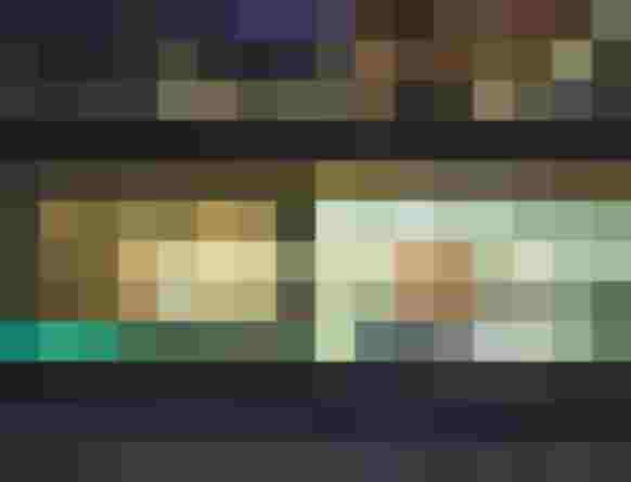 Infinity Pool bei Nacht am Wellnesshotel mit moderner Glasfassade und entspannter Atmosphäre