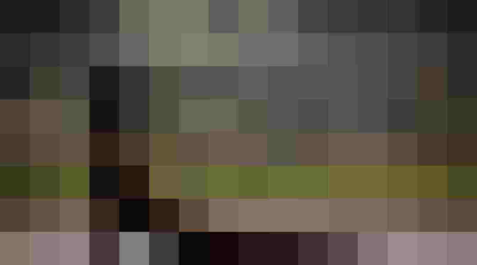 Person doing yoga exercise with mountain view