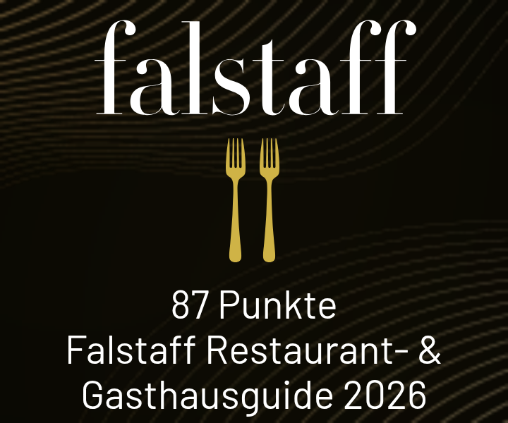 Falstaff-Auszeichnung mit 87 Punkten im Restaurant- & Gasthausguide 2026 auf dunklem Hintergrund
